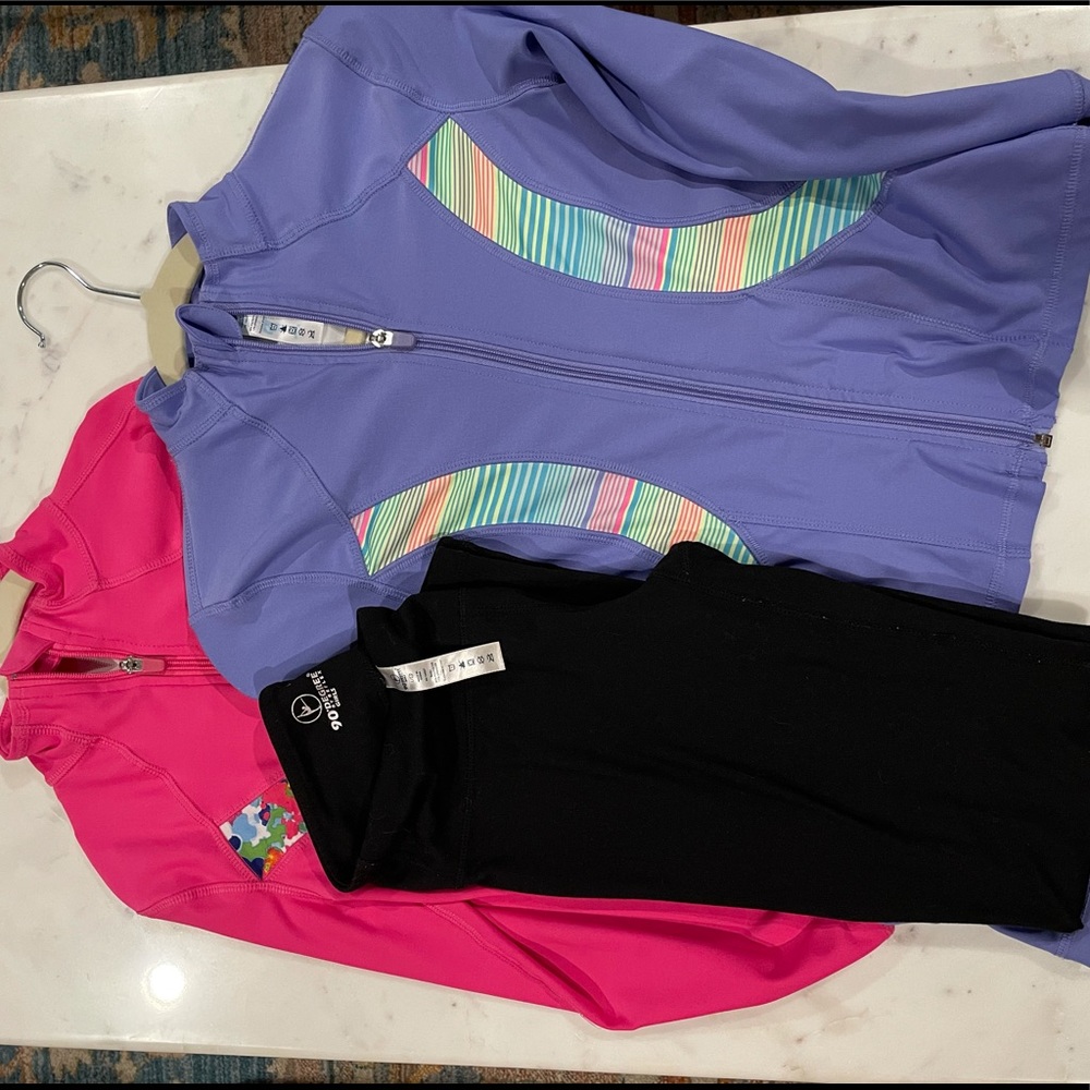 Lot of girls 10-12 athletic wear. Two jackets and a pair of leggings